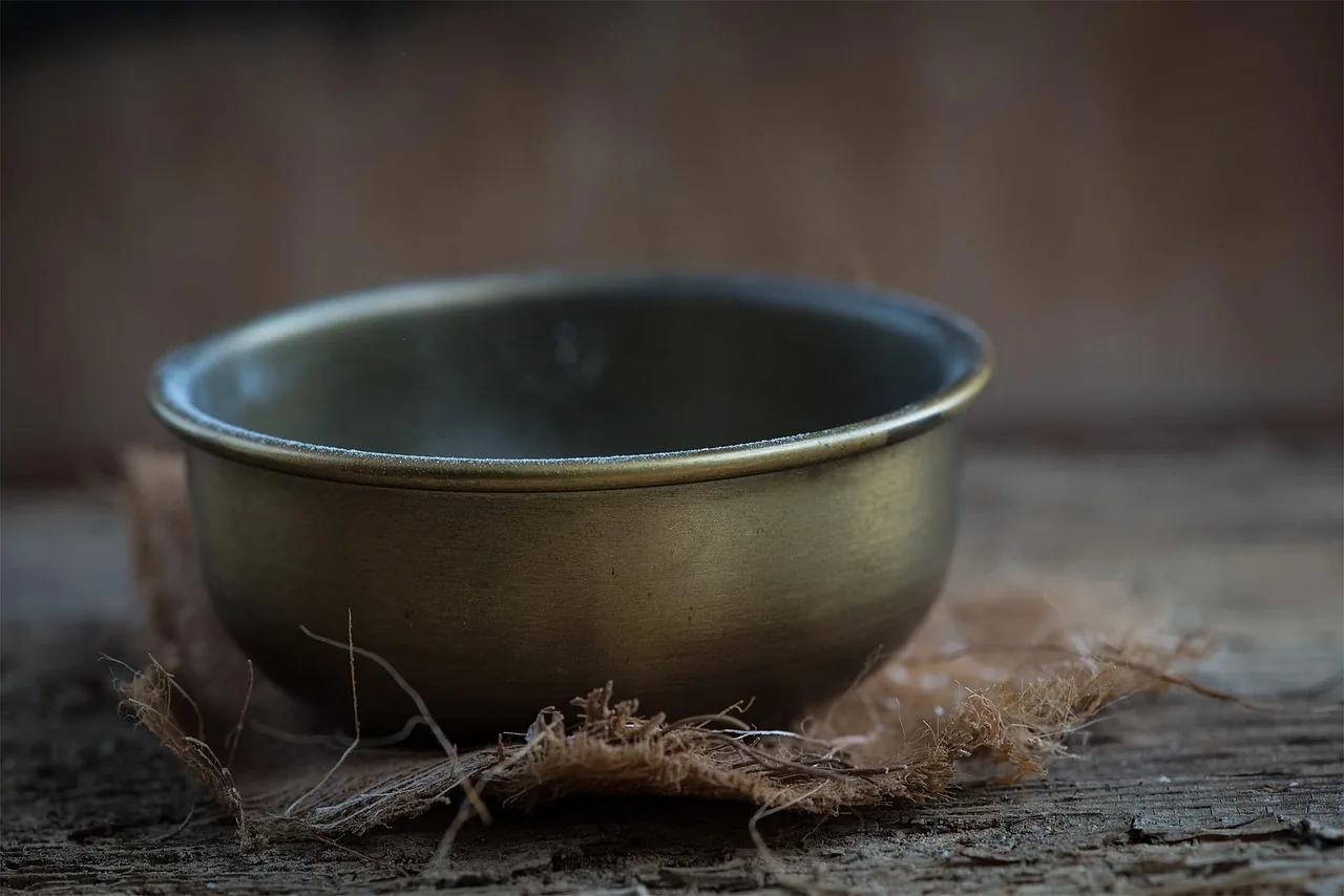 Tibetan singing bowl on wood Tibetan singing bowl on wood