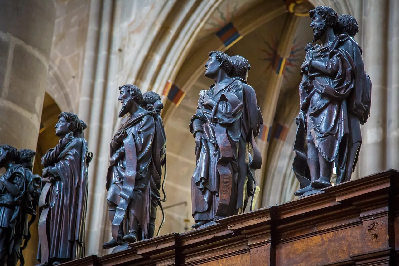 statues in a Catholic church statues in a Catholic church