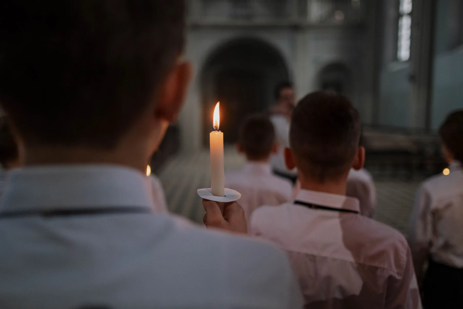 Choir by candlelight in a church Choir by candlelight in a church