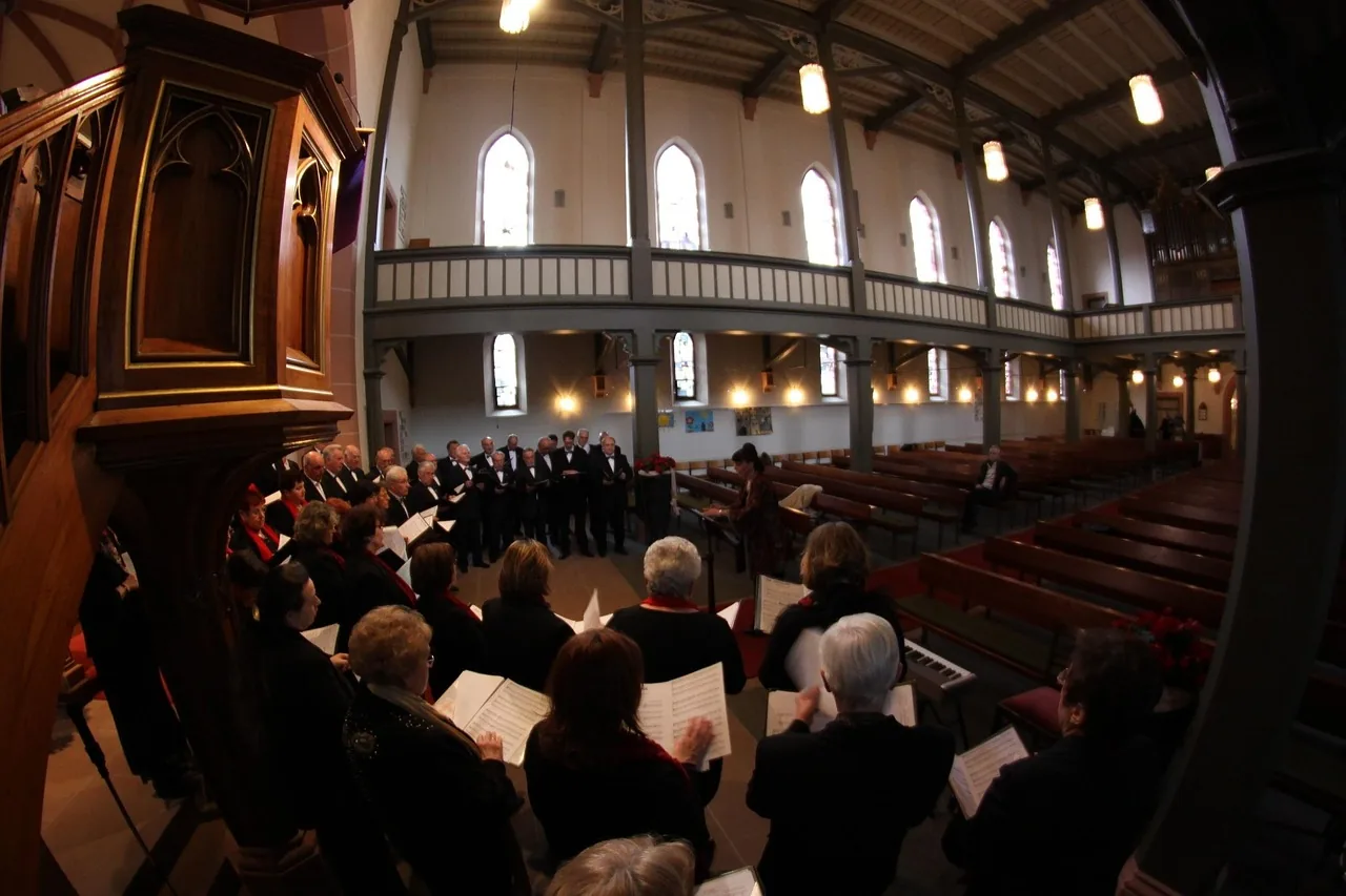 church choir singing with sheet music church choir singing with sheet music