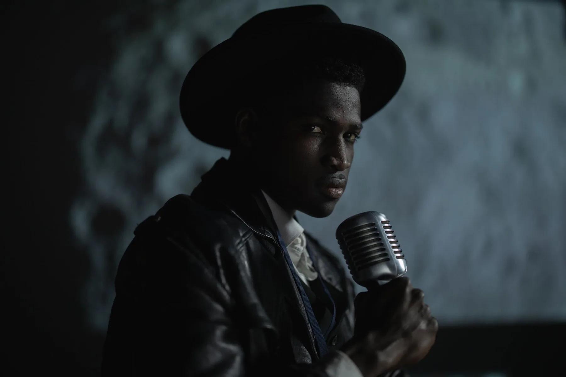 singer with microphone on stage