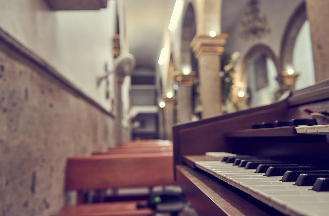 piano in a church for a religious hymn