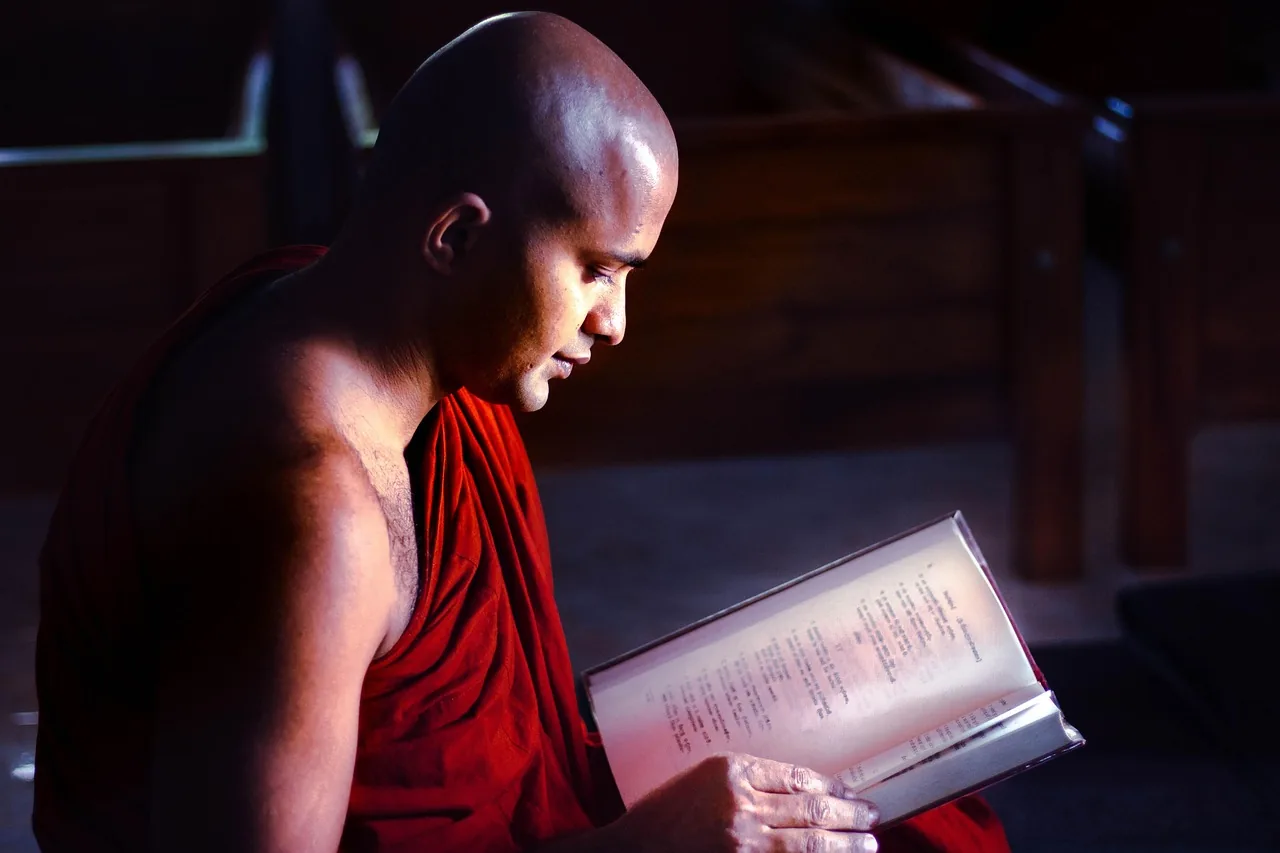 monk reading a chant book monk reading a chant book