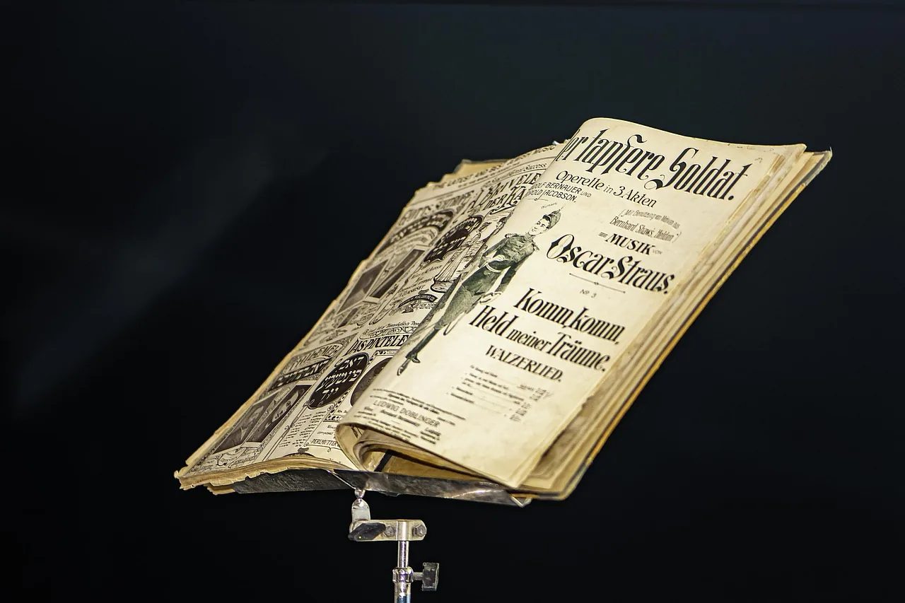 printed scores on a music stand printed scores on a music stand