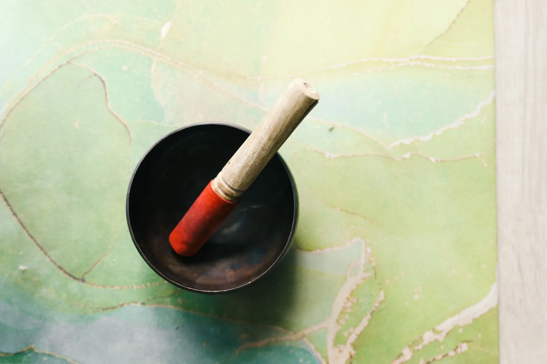 black Tibetan bowl with mallet black Tibetan bowl with mallet