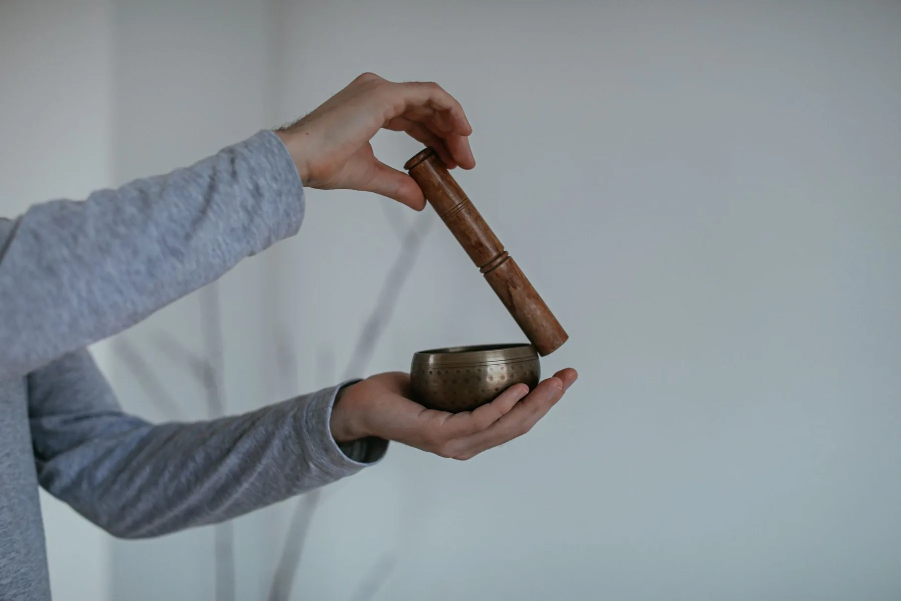 Tibetan bowl held with a mallet Tibetan bowl held with a mallet