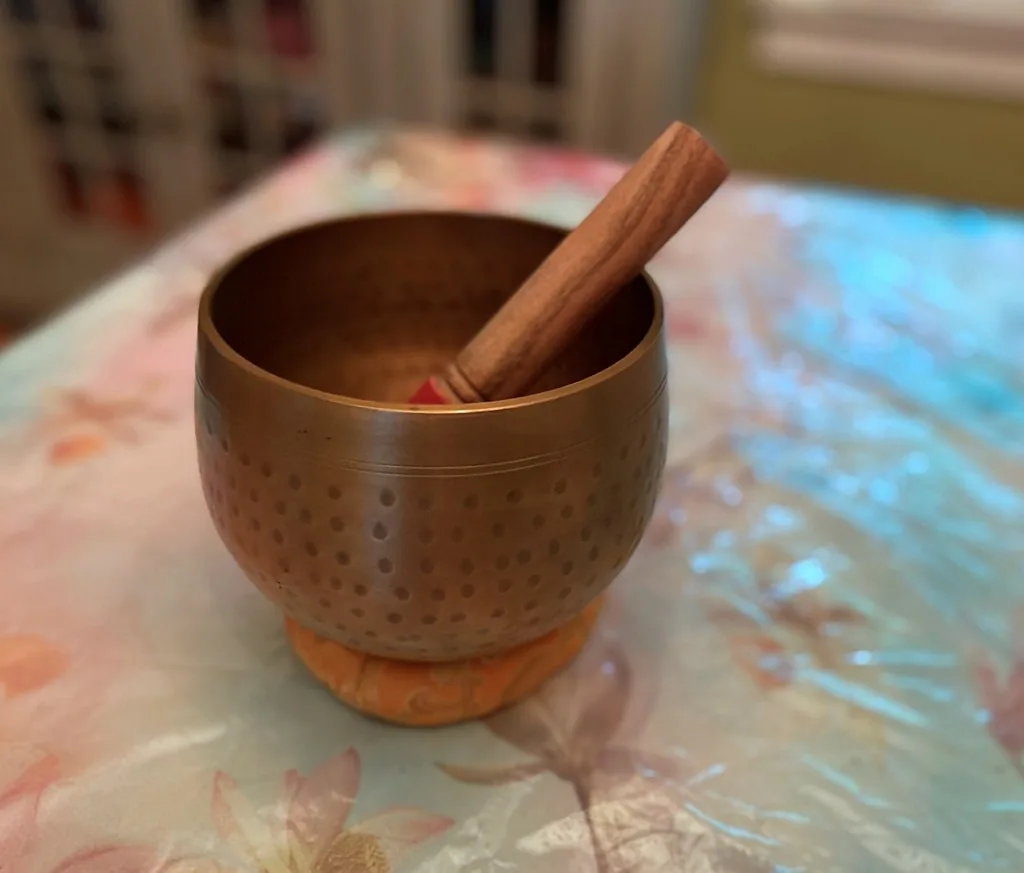 Tibetan singing bowl with wooden mallet